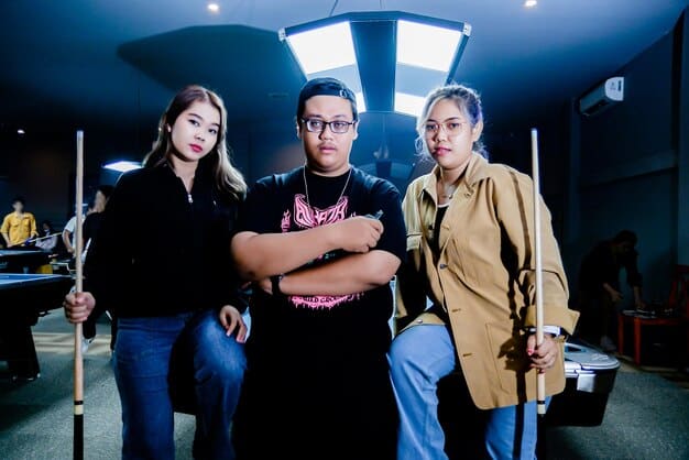 A behind-the-scenes shot of a K-drama set with a mix of Korean and American crew members working together. The focus is on the collaboration and integration of different production styles.