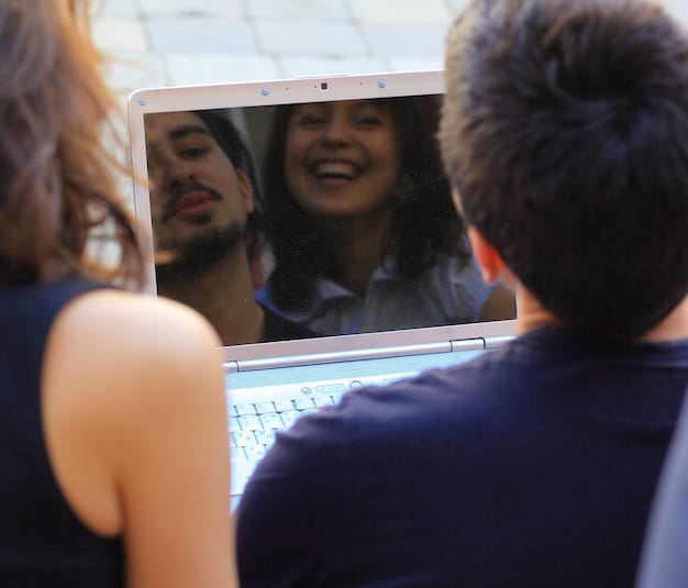 A split image showing American viewers of diverse backgrounds enjoying K-dramas on various devices, emphasizing the broad appeal and accessibility of the content.