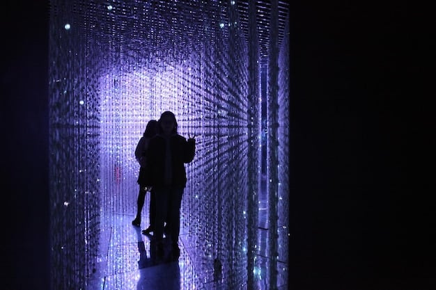 A still from a sci-fi thriller K-drama featuring a character interacting with a holographic display or advanced technology, emphasizing the futuristic setting and visual effects.