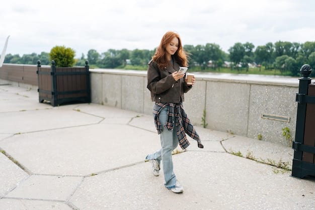 A candid shot of Suzy Bae in casual wear, walking down a street in the US. She is wearing a comfortable yet stylish outfit, showcasing her everyday fashion sense.