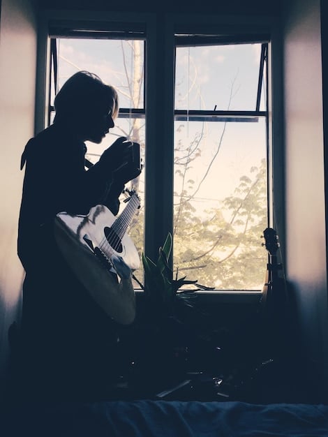 A soft, artistic photo of Park Shin Hye with a gentle, loving expression, possibly near a window with natural light, evoking the emotional depth of motherhood and personal reflection.