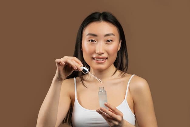Close-up shot of Han Hyo Joo applying a hydrating serum to her face, showcasing the dewy texture and healthy glow of her skin. Focus on the product in her hand and the application technique, highlighting the importance of skincare in her routine.